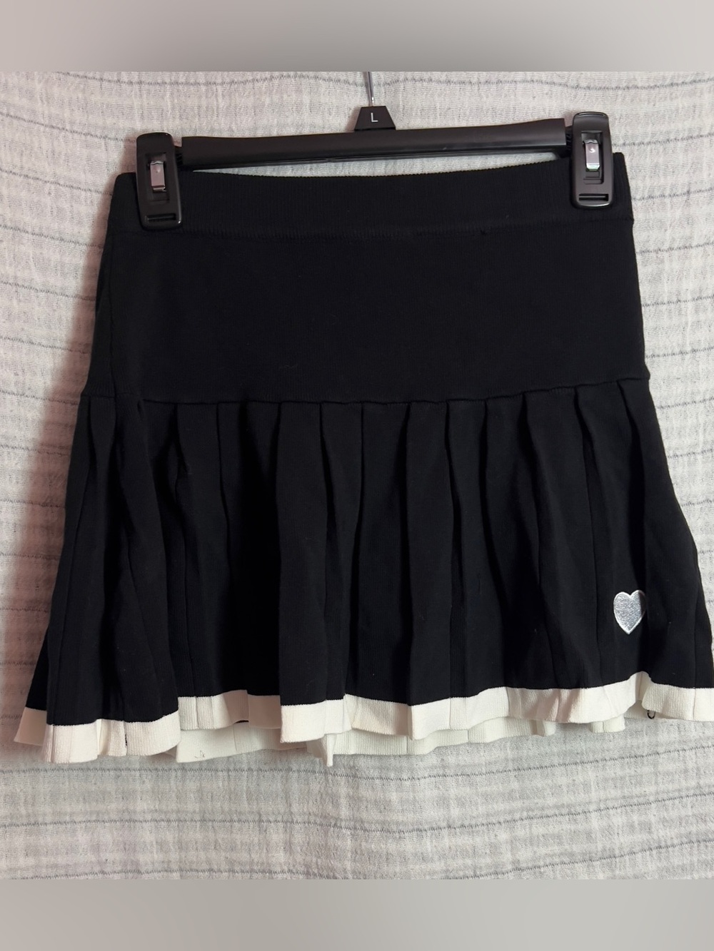 Black Pleated Mini Skirt with White Hem and Heart Detail